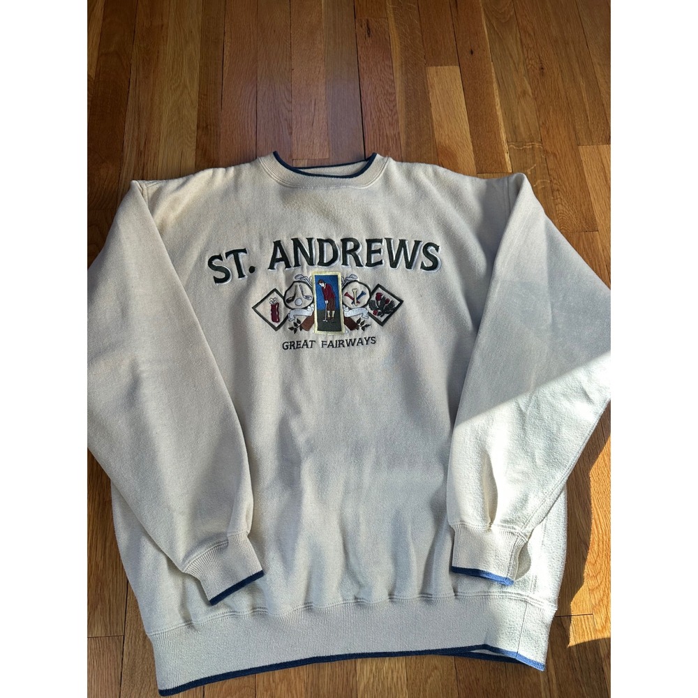 st. Andrews golf sweatshirt has an iron mark on the sleeve size large